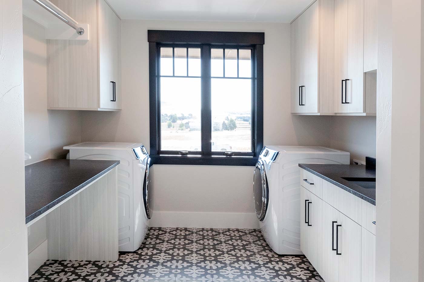 Laundry room with designer tile